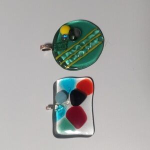 2 ornate art glass pendants